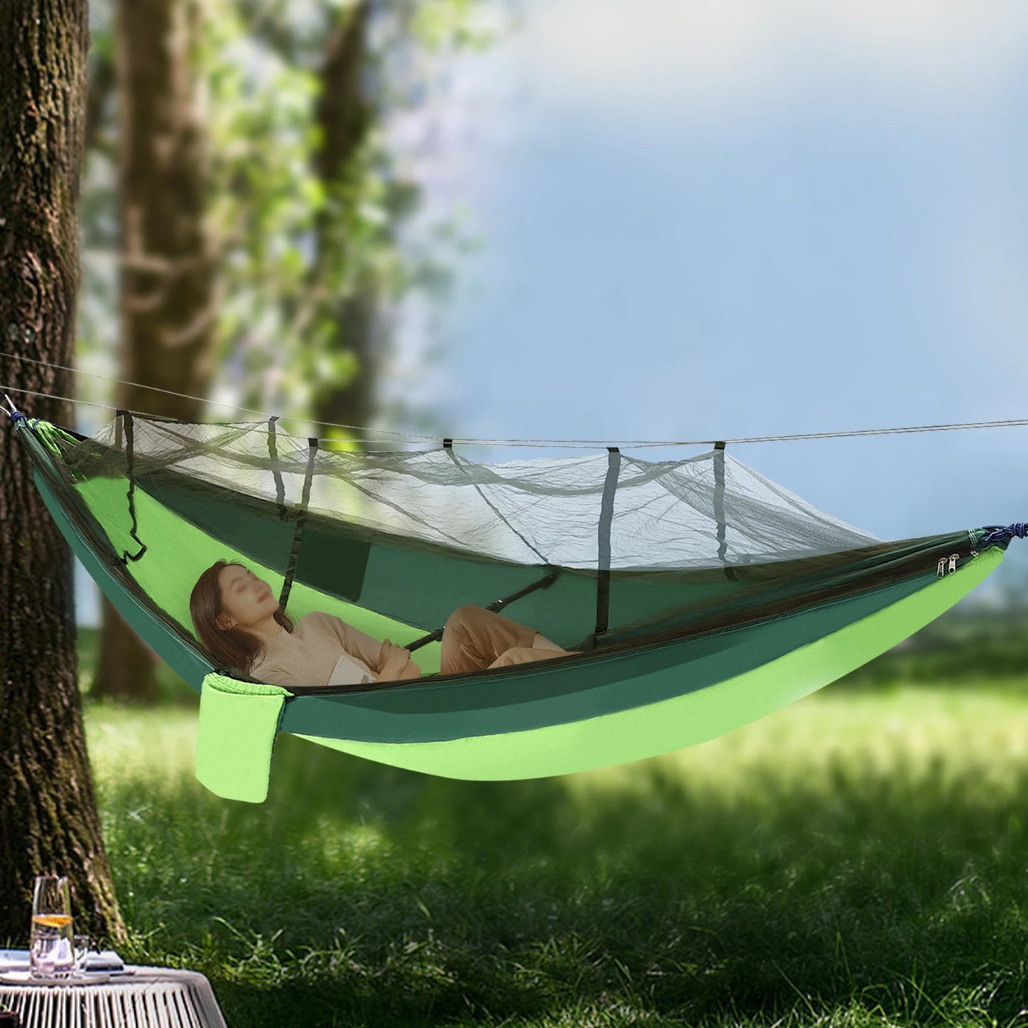 "Foldable Outdoor Hammock with Mosquito Net and Tree Straps for Camping and Travel"